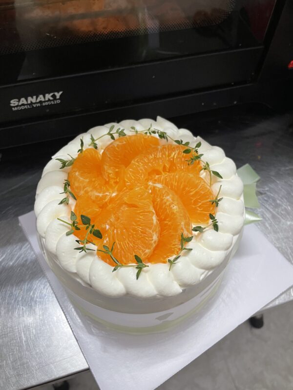 Orange Whipped birthday cake in Hoian